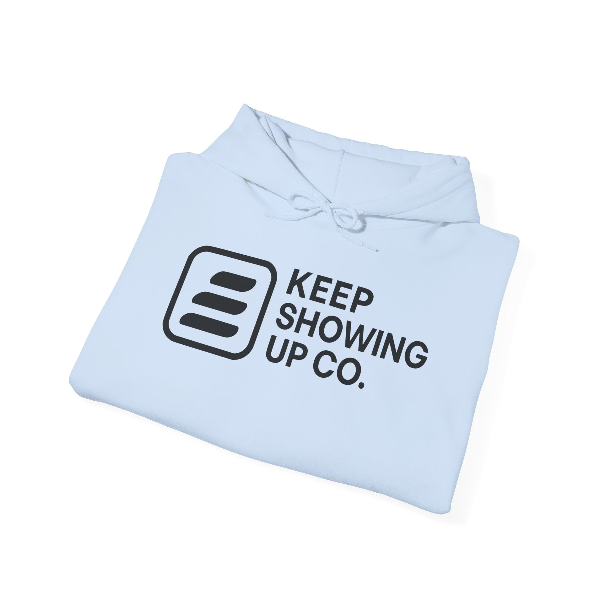 Light blue hoodie with 'KEEP SHOWING UP CO.' text on a white background