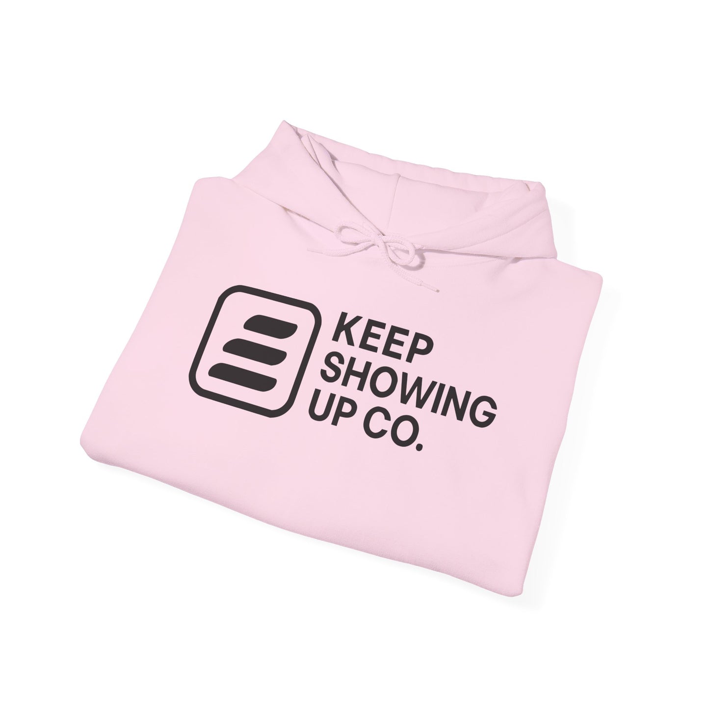 Pink hoodie with 'Keep Showing Up Co.' text on a white background