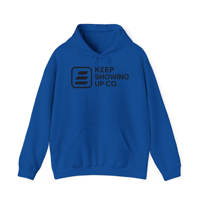 Blue hoodie with 'Keep Showing Up Co.' text and logo on a white background