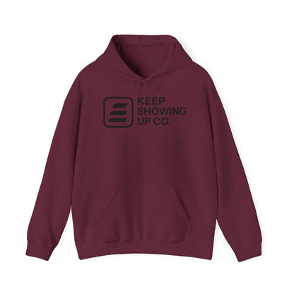 Maroon hoodie with 'Keep Showing Up Co.' text and logo on a white background